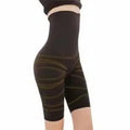 Black high-waisted leggings with a subtle pattern on a plain background
