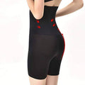 Black shapewear with red accents on a white background